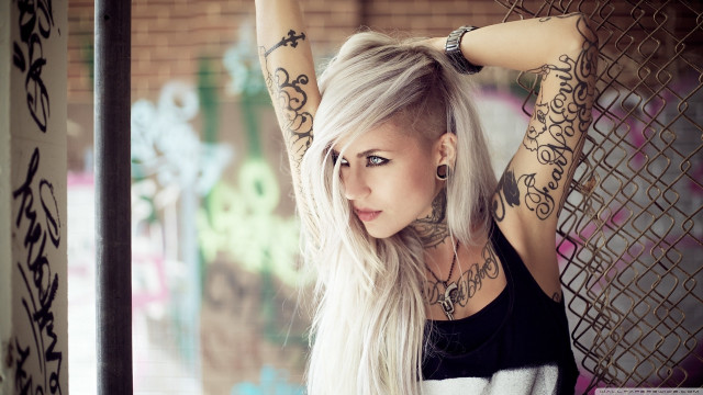 Tattooed woman white hair fence free wallpaper - medium preview image