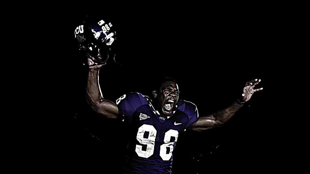 Football player hands up smiling free wallpaper - medium preview image