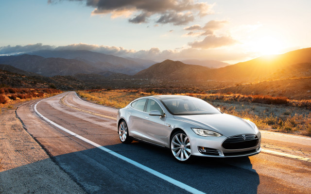 White car driving mountains sunset free wallpaper for desktop - medium preview image