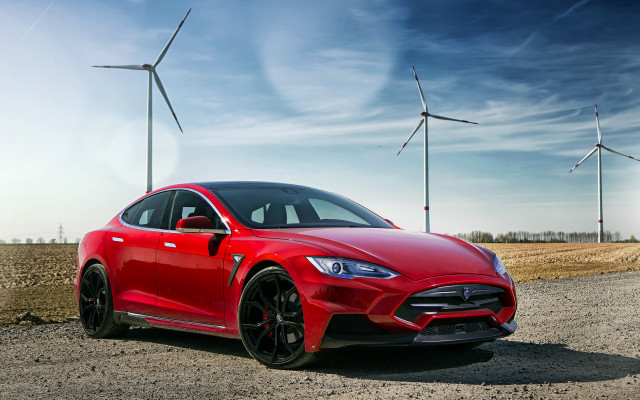 Red car windturbines grass blue free wallpaper - medium preview image