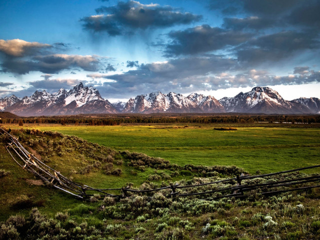 Fence field mountains clouds sky free wallpaper - medium preview image