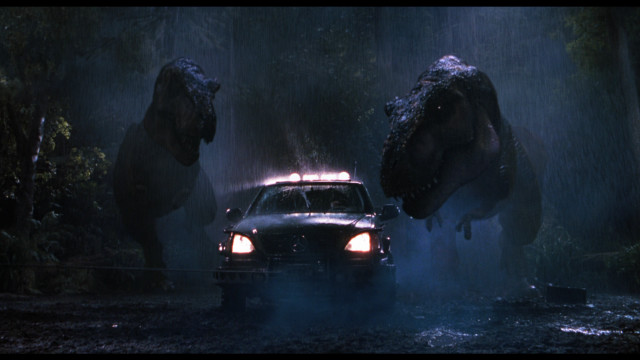 Car forest dinosaurs rain night free wallpaper - medium preview image