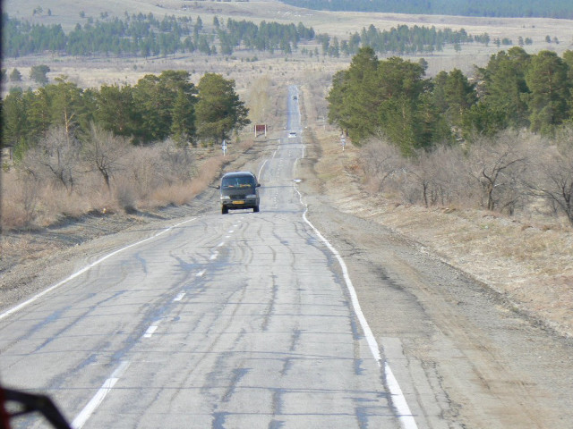 Truck driving road trees hill free wallpaper - medium preview image