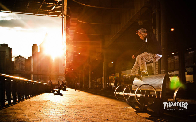 Man skateboarding rail city sunset free wallpaper - medium preview image