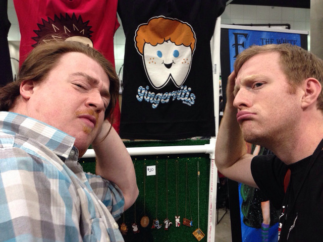 Two men sitting shirt rack free wallpaper - medium preview image