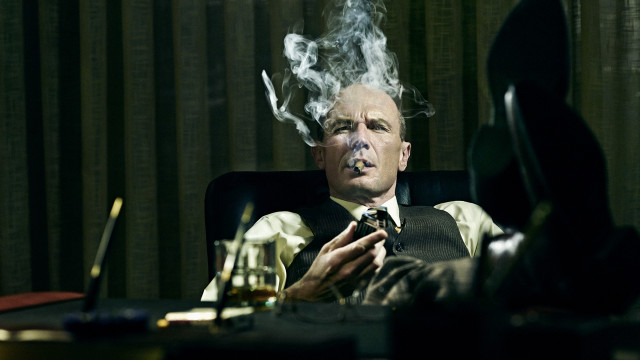 Man chair smoking cigarette serious free wallpaper - medium preview image