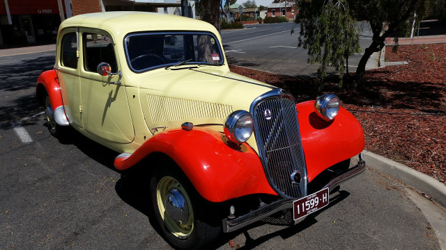 Yellow red car parked tree free wallpaper - medium preview image