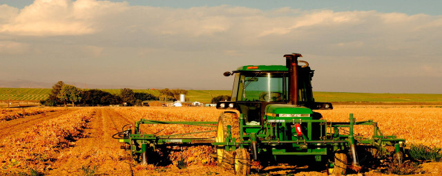 Tractor driving field crops fall free wallpaper - medium preview image