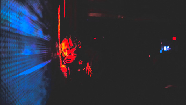 Person dark room light projection free wallpaper - medium preview image