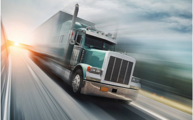 Semi truck highway cloudy sky free wallpaper - medium preview image