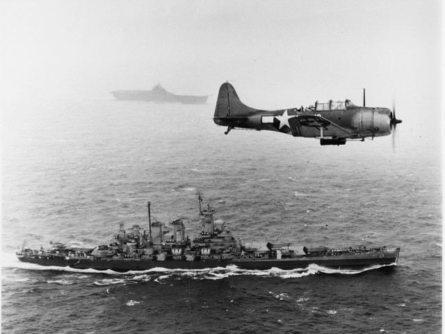 Small plane flying ship ocean free wallpaper - medium preview image