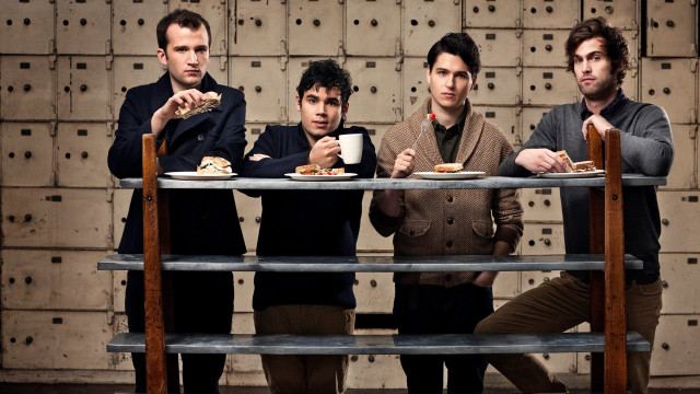 Three men sitting table eating free wallpaper - medium preview image