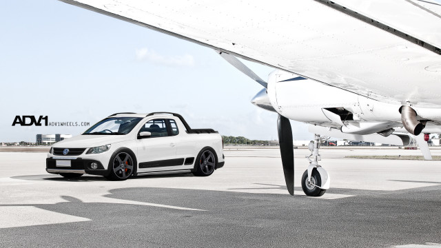 White car parked white airplane free wallpaper - medium preview image