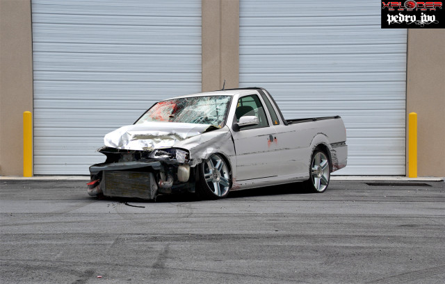 White truck smashed windshield garage free wallpaper - medium preview image