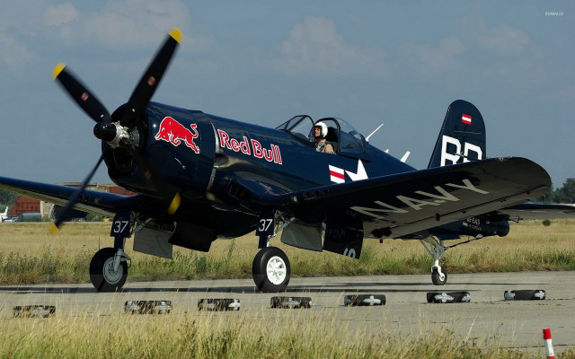 Small blue plane runway grass free wallpaper - medium preview image