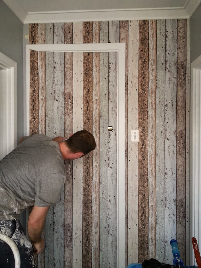 Man painting striped wall ladder free wallpaper - medium preview image