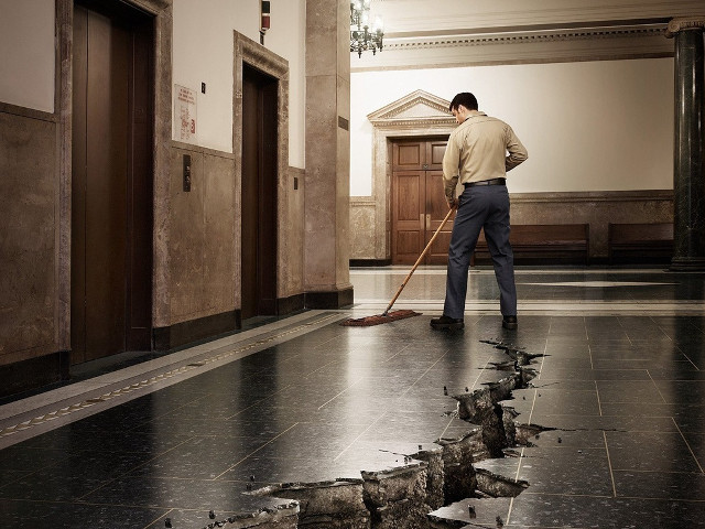 Man sweeping floor broom hole free wallpaper - medium preview image