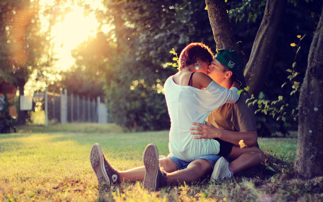 Man woman hugging grass tree #3 free wallpaper - medium preview image