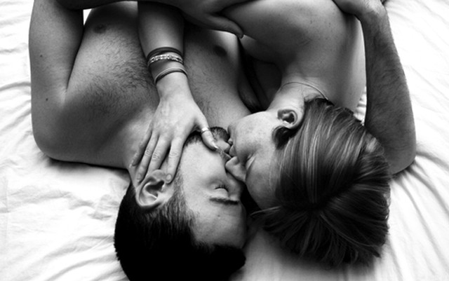 Man woman laying bed together free wallpaper - medium preview image