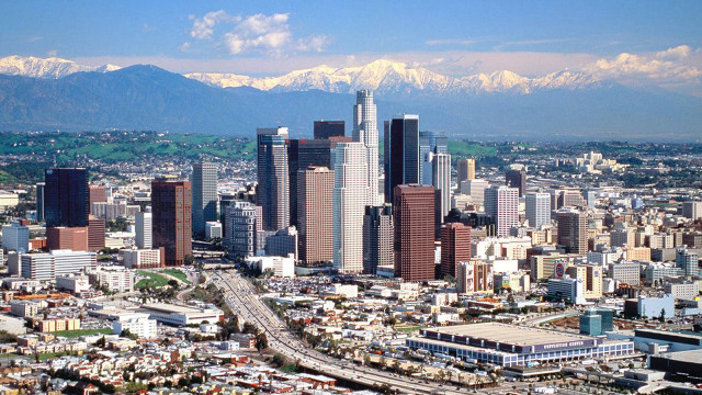 City tall buildings mountains background #2 free wallpaper - medium preview image