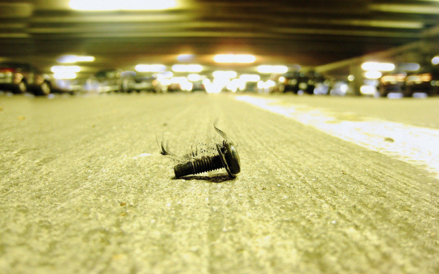 Broken bottle parking garage night free wallpaper - medium preview image
