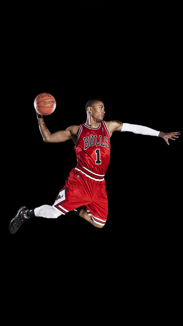 Man red uniform jumping basketball free wallpaper - medium preview image