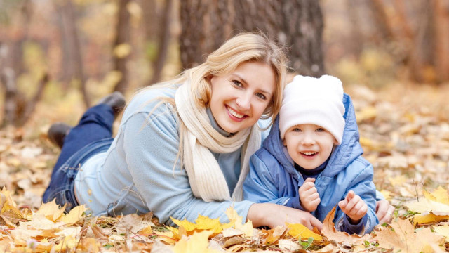 Woman child leaves forest trees free wallpaper - medium preview image