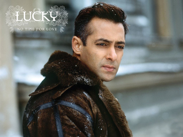 Man furcoat snowy lucky sign free wallpaper - medium preview image