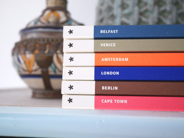 Stack of books table vase free wallpaper - medium preview image