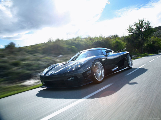 Black sports car road forest free wallpaper - medium preview image