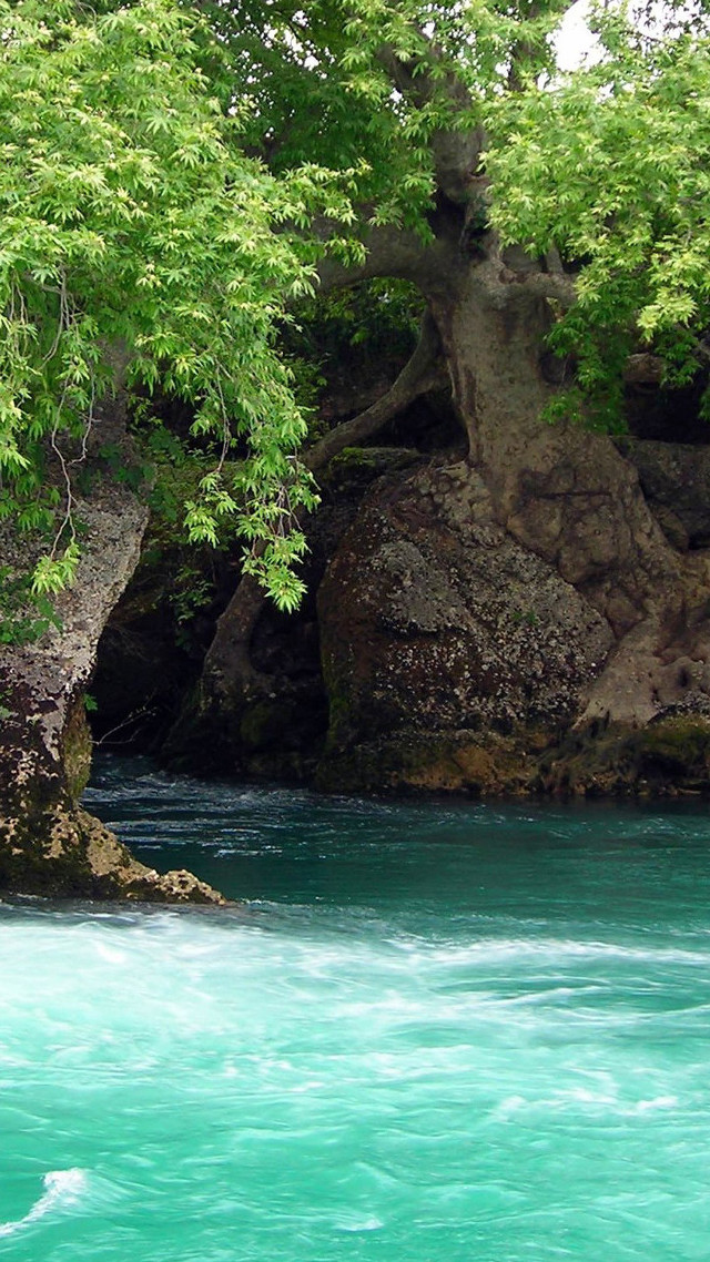 Man kayaking river rock formation free wallpaper - medium preview image
