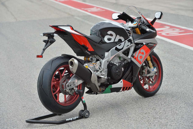 Motorcycle parked track red tire free wallpaper - medium preview image