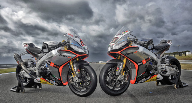 Motorcycles parked road cloudy sky free wallpaper - medium preview image
