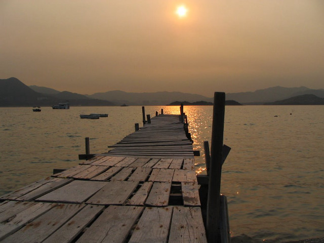 Wooden dock boat sunset mountains free wallpaper - medium preview image