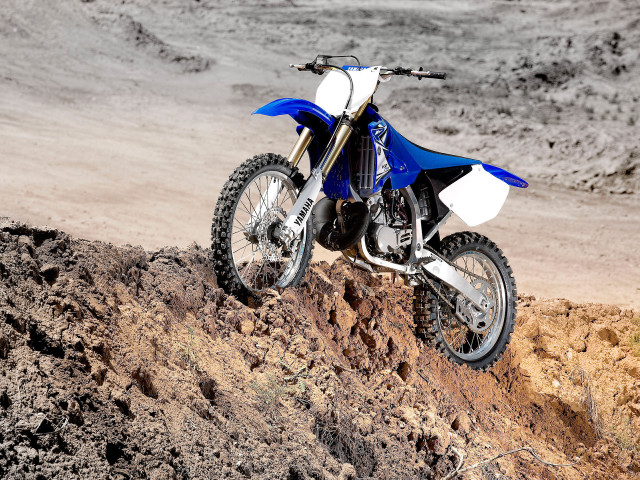 Dirt bike parked hill desert free wallpaper - medium preview image
