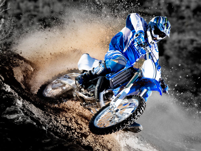 Man riding dirt bike muddy free wallpaper - medium preview image