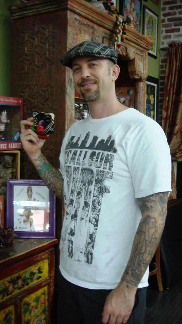 Man tattooed arm cellphone selfie free wallpaper - medium preview image