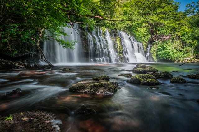 Waterfall rocks trees blue sky free wallpaper - medium preview image