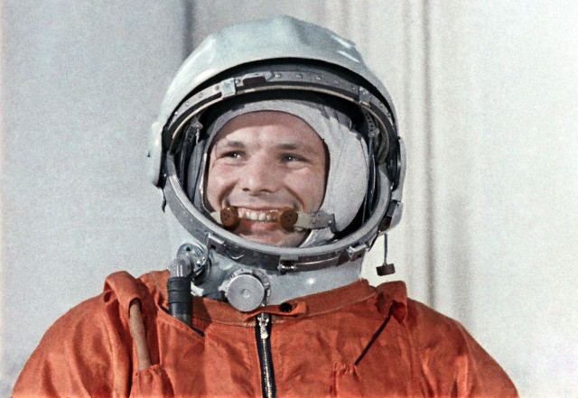 Man space suit cigarette helmet free wallpaper - medium preview image