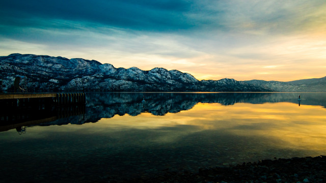 Lake mountains person dock bird free wallpaper - medium preview image