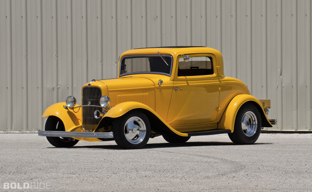 Yellow truck parked building metal free wallpaper - medium preview image