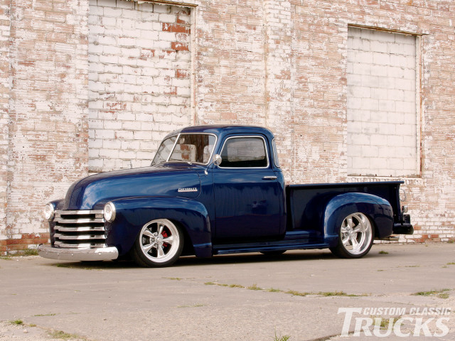 Blue truck brick building open free wallpaper - medium preview image