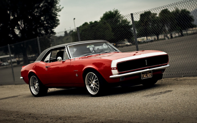 Red car parked fence black #2 free wallpaper - medium preview image