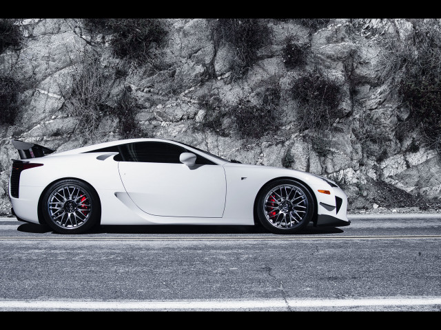 White sports car mountain rock free wallpaper - medium preview image