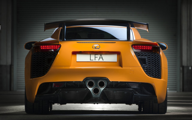 Yellow sports car garage license free wallpaper - medium preview image