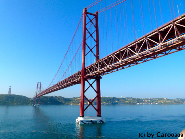 Boat floating under bridge water free wallpaper - medium preview image