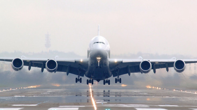 Jetliner takeoff night fog airport free wallpaper - medium preview image