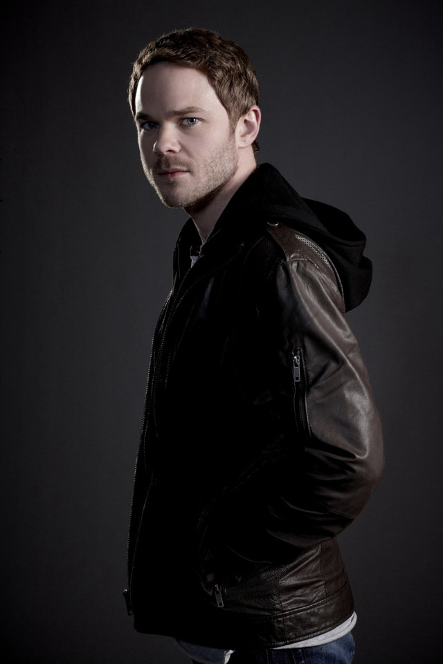 Man leather jacket posing hands free wallpaper - medium preview image