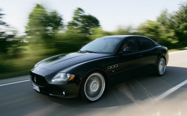 Black car driving road trees free wallpaper - medium preview image