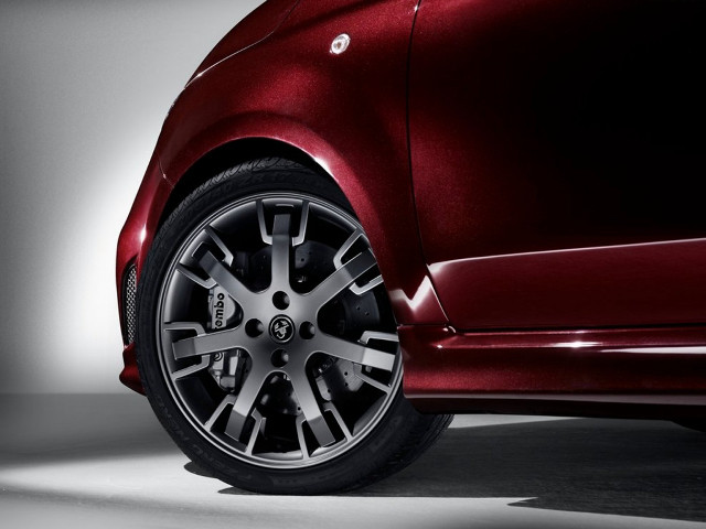 Red car wheel closeup white free wallpaper - medium preview image